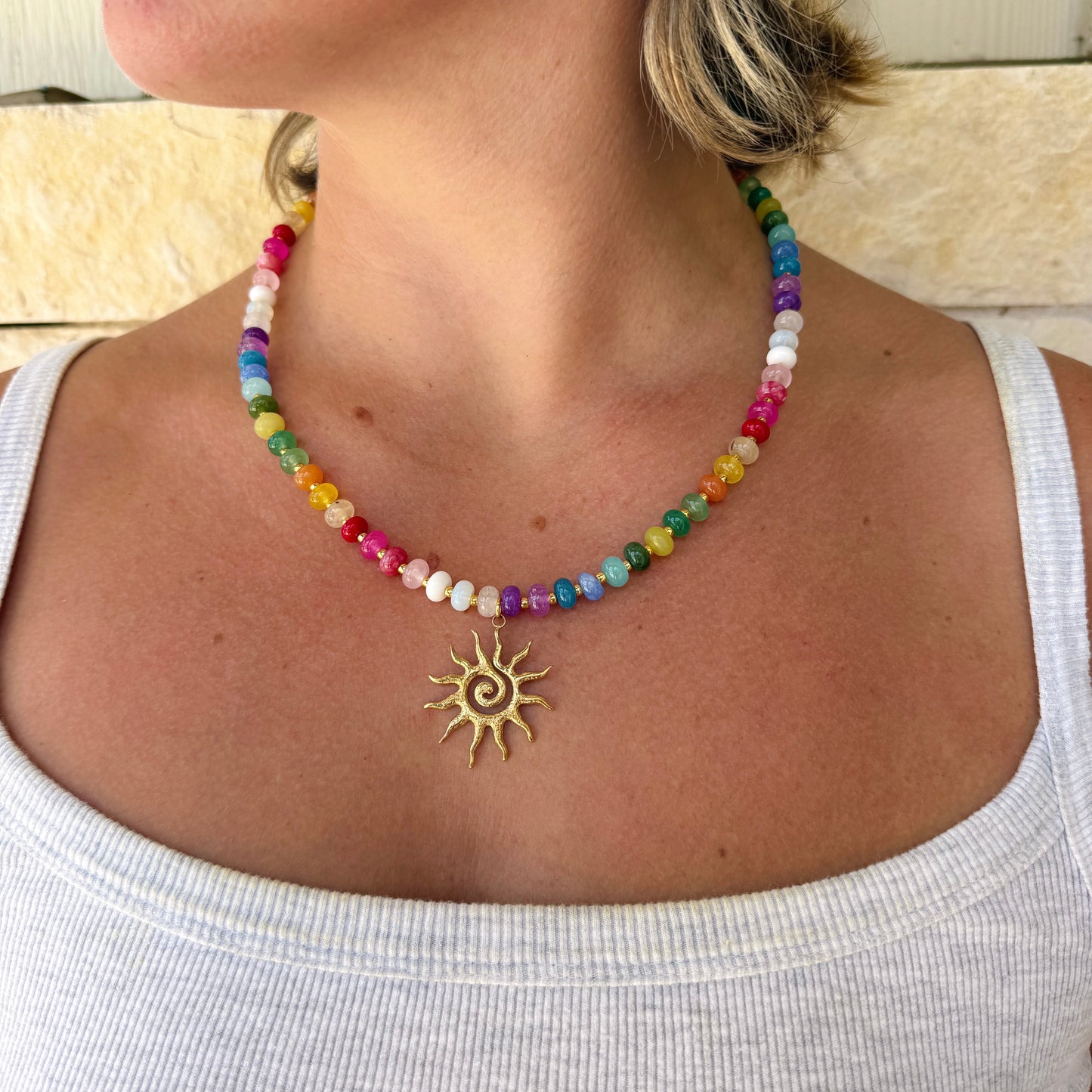 sun charm on rainbow